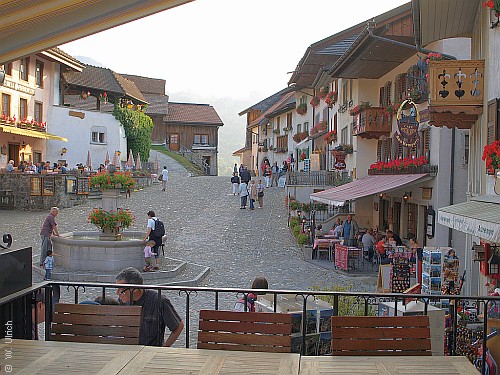 Looking backwards to the village entry from one of the many street cafés (click to enlarge)